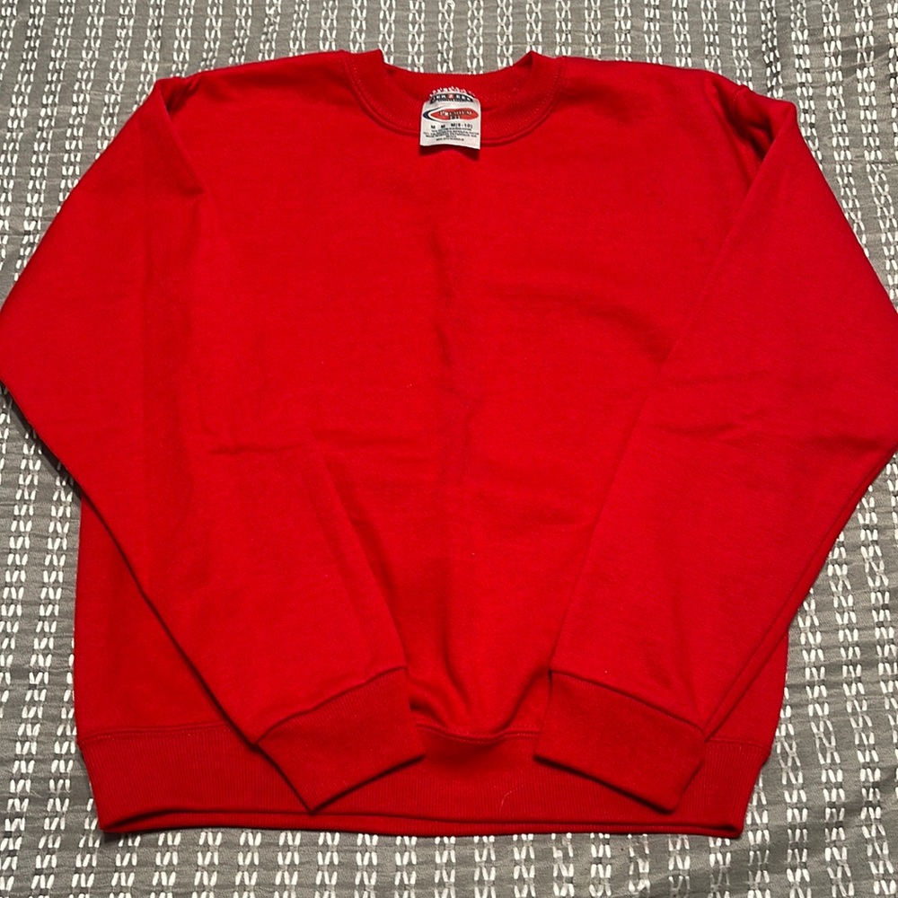 Jerzees red sweatshirt. New. Never been worn. Sz 8-10.